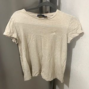 Ralph Lauren polo size small in the color cream